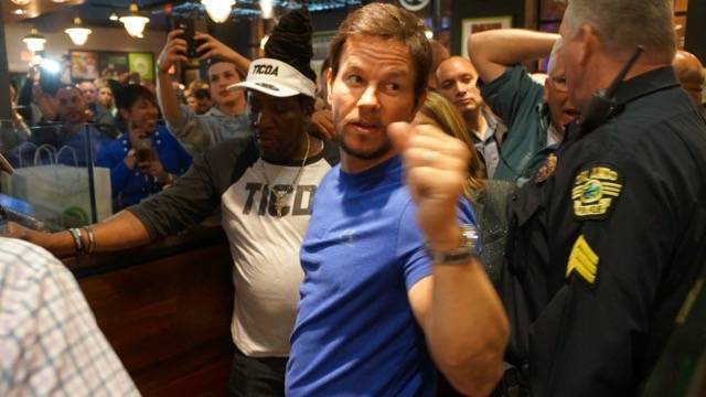 Wahlburgers opening fistbumping